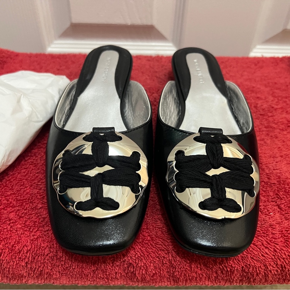 Tory Burch Black Leather Slip-On Mules with Silver Medallion